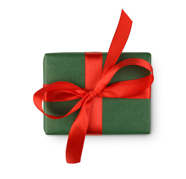 istock Christmas holiday gift box in green paper isolated on white 628133824