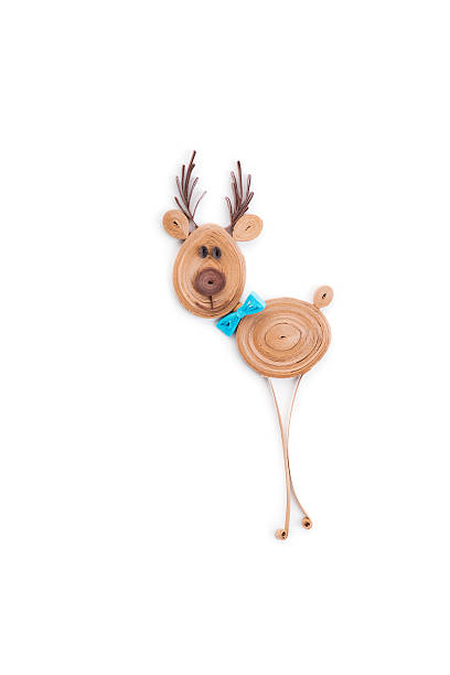 istock Creative paper reindeer on a white background. Quilling 628137960
