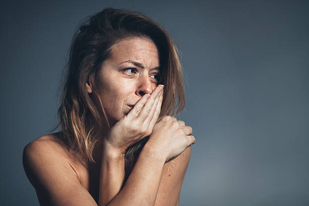 Young woman sad and depressed Young woman sad and depressed, studio shot women crying stock pictures, royalty-free photos & images