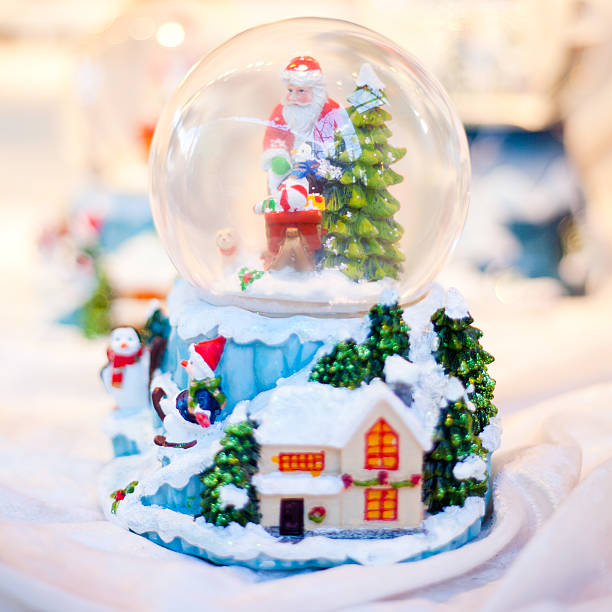 istock Santa Clause winter globe  -  glass ball. 628146200