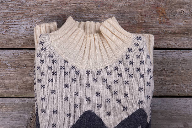 istock Detail of folded knitted sweater. 628155298