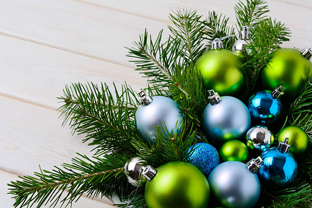 istock Christmas background with blue, green and pale blue ornaments 628155562