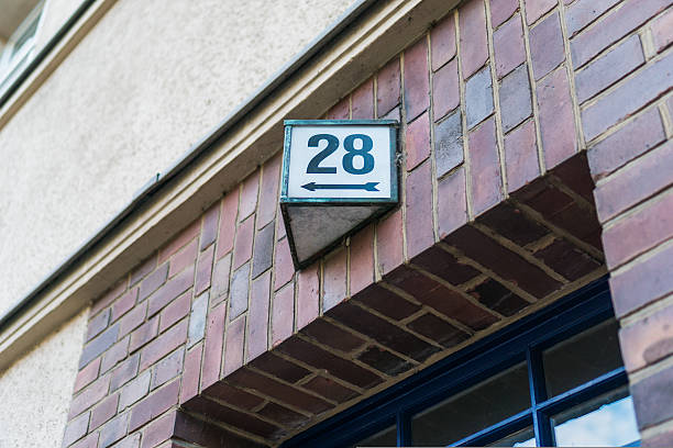 istock weathered house number twenty eight (28) 628155956
