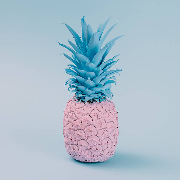 istock Pink pineapple on blue pastel background. Minimal style. Food co 628156030