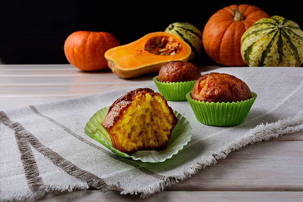 istock Spiced butternut squash muffins in the green wrappers 628157180