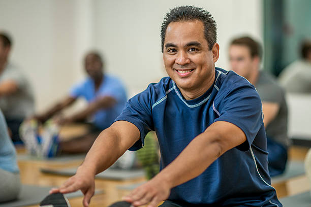 istock Stretching After a Fitness Class 628157230