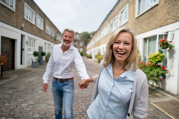 istock Woman pulling her couple on the street 628157676
