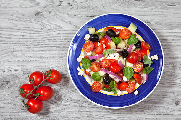 istock Greek salad and tomatoes on a stem 628158200