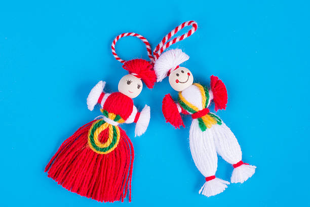 istock Bulgarian Martenitsa spring sign on blue background 628158616