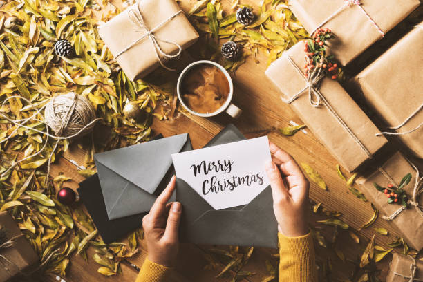 Writing greeting cards, Christmas table top flat lay
