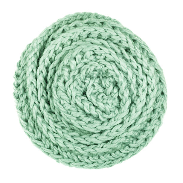 istock Green wool scarf isolated on white background. 628159190