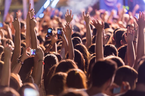 istock Hand with a smartphone records live music festiva 628161252