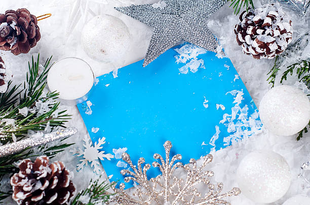 istock Christmas card with decorated fir tree on snow. 628161944