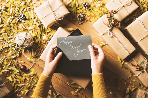 istock Writing greeting cards, New Year table top flat lay 628162868