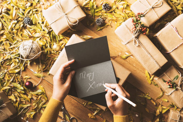 istock Writing greeting cards, Christmas table top flat lay 628163302