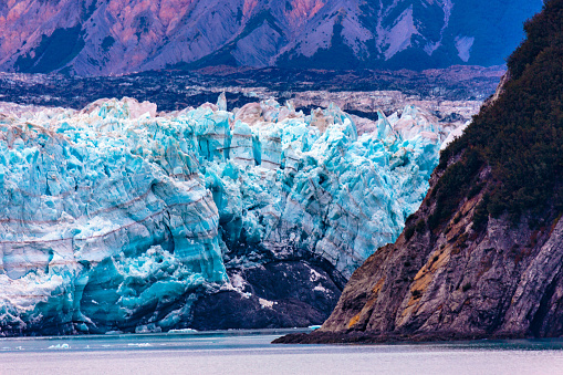 Hubbard Glacier, Alaska, USA - Sept. 11, 2016: This tidewater glacier is located in eastern Alaska and is part of Yukon Canada, off the coast of Yakutat—200 miles NW of Juneau Alaska. it is more than six miles wide where it meets the ocean.