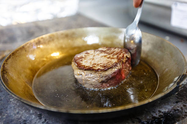 chateaubriand of beef tenderloin fried in a skillet. - scotch steak imagens e fotografias de stock