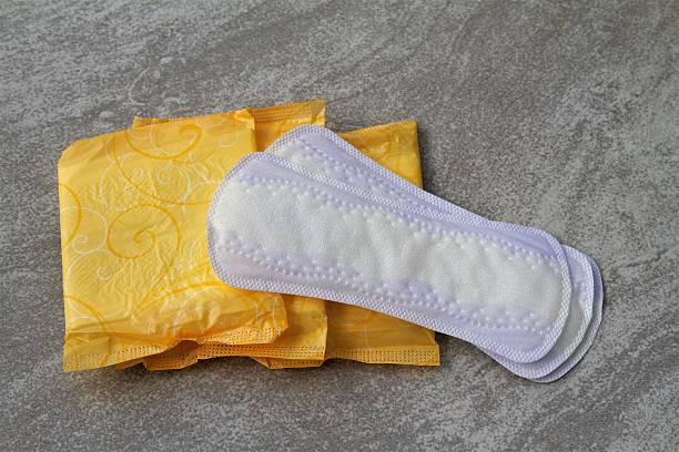 Women's personal hygiene items: pads and liners stock photo
