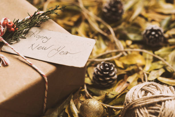 istock Giving presents, Happy New Year greeting card, wrapped gift box 628167204