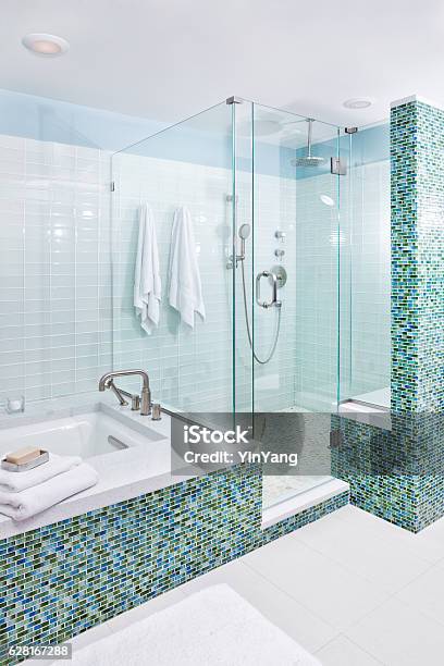 Contemporary Home Bathroom With Shower Stall Tub And Glass Tiles Stock Photo - Download Image Now