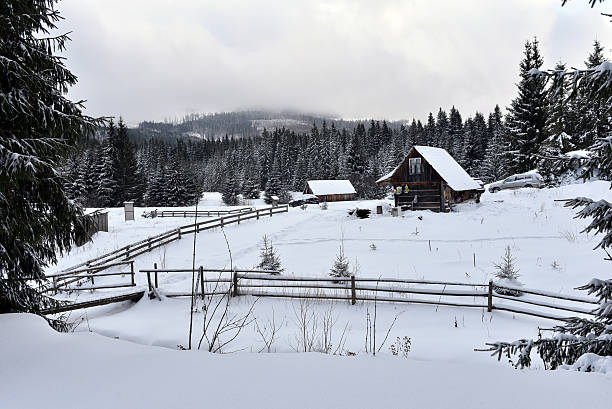 istock Winter landscape with a small wooden hut 628167948