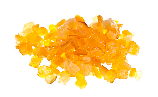 Sweet candied diced citrus peel isolated on a white background