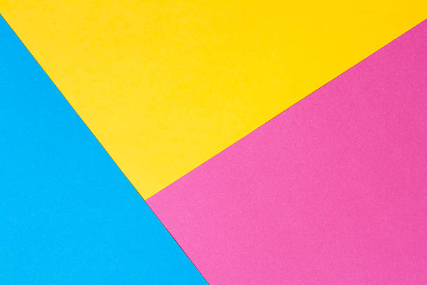 Colored paper in a geometric flat composition. Colour tinted sheets. Blue, yellow and pink toned image stock pictures, royalty-free photos & images