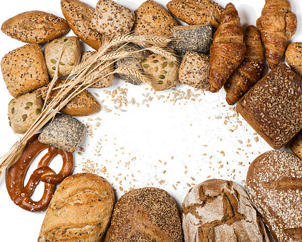 istock Frame of various types of bread and rolls, above view. 628172190