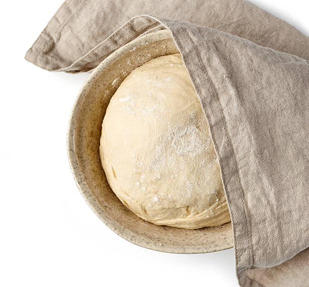 istock bowl of dough and linen towel 628192370