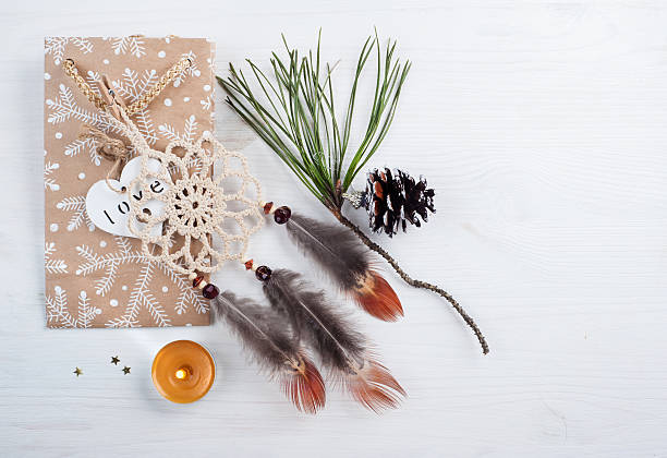 istock Gift kraft bag and beige dream catcher 628192476