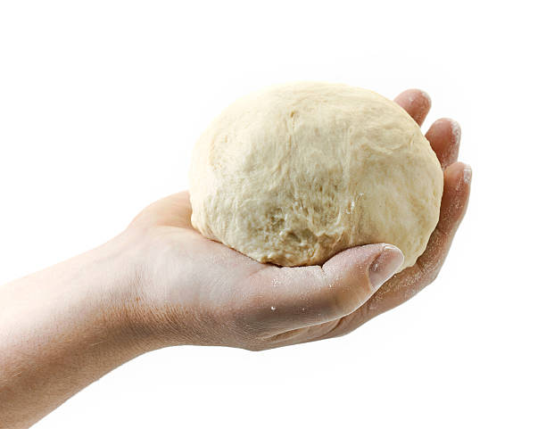 fresh dough ball in human hand - dough sphere kneading bread imagens e fotografias de stock