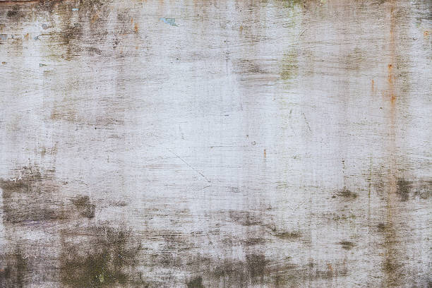 Rusty metal wall background Background of old metal surface painted with white paint. Grunge wall texture rusty stock pictures, royalty-free photos & images