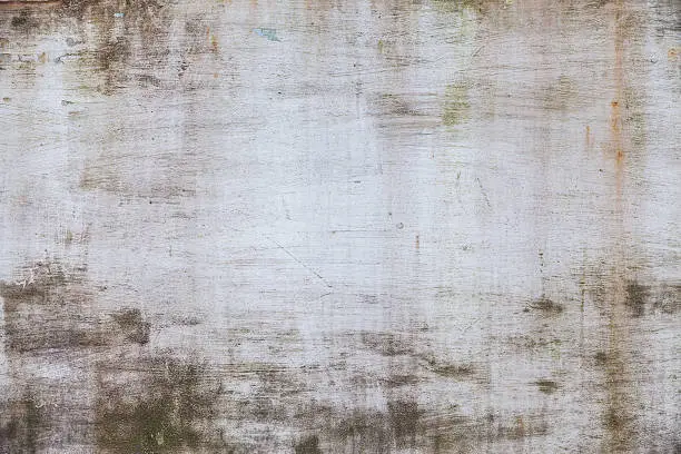 Background of old metal surface painted with white paint. Grunge wall texture