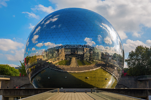 Paris, France - October 15, 2016: La Geode in the Parc de la Villette with unidentified people. Its a mirror-finished geodesic dome with an Omnimax theatre at the Cite des Sciences et de l Industrie
