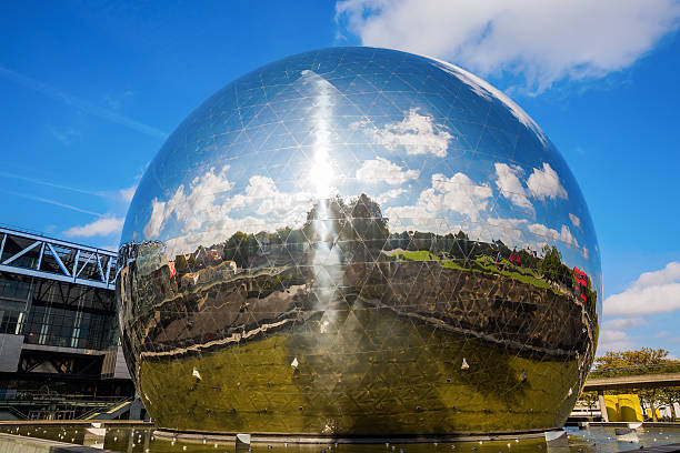 Paris, France - October 15, 2016: La Geode in the Parc de la Villette with unidentified people. Its a mirror-finished geodesic dome with an Omnimax theatre at the Cite des Sciences et de l Industrie