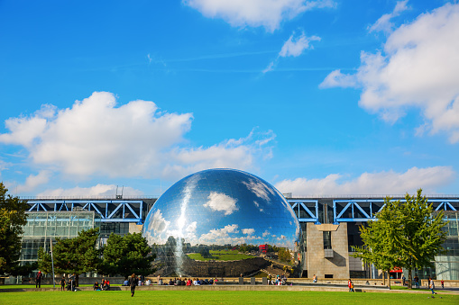 Paris, France - October 15, 2016: La Geode in the Parc de la Villette with unidentified people. Its a mirror-finished geodesic dome with an Omnimax theatre at the Cite des Sciences et de l Industrie