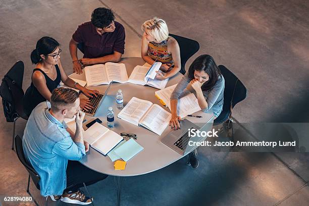 Mixed Race Students Studying Together Stock Photo - Download Image Now - University Student, Student, Computer