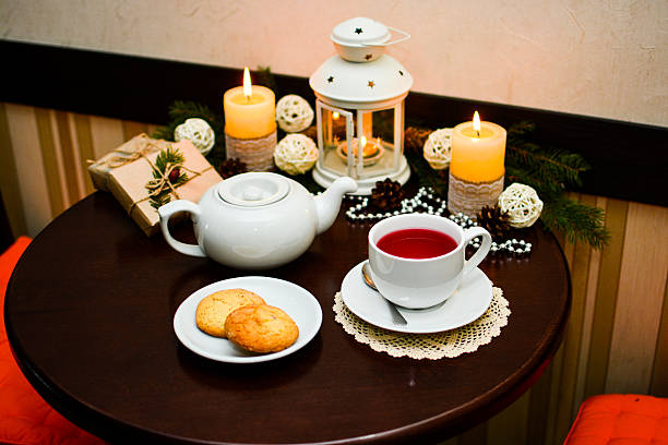 istock Cookies on plate and cup of tea in cafe. 628194346