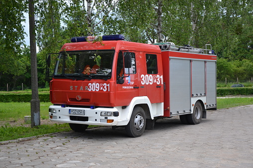 Bednary, Poland - June 14th, 2013: Star 12-157 firetruck stopped on the street. The firetrucks based on Star models are the ones of the most popular firetrucks in Poland.