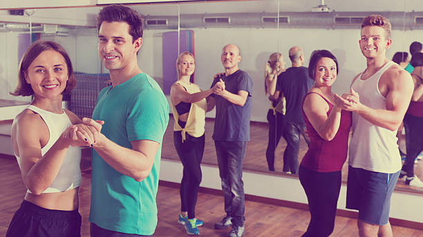 istock Men and women dancing salsa o bachata 628196568