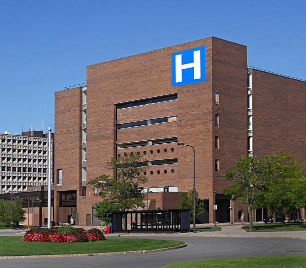 istock large building with H sign for hospital 628208836
