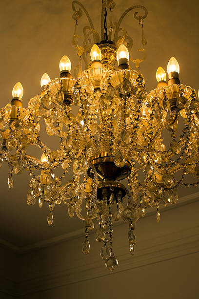 istock Gorgeous antique chandelier in a room 628218144