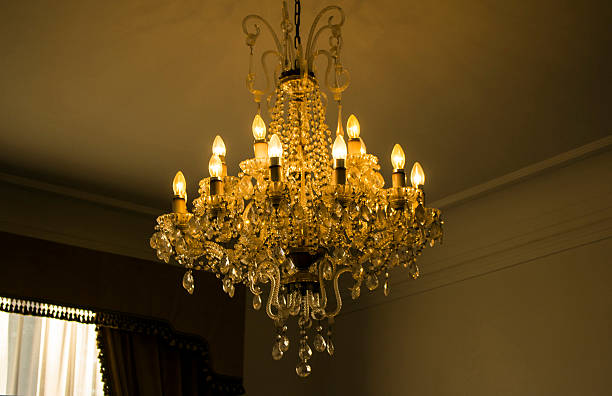 istock Gorgeous antique chandelier in a room 628218154