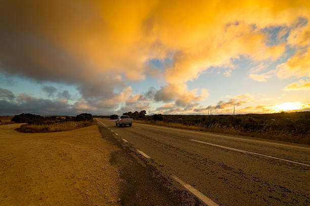 istock Picturesque landscape scene and sunset above road 628219046