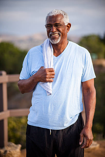 istock Black Man drying off with towel 628219214