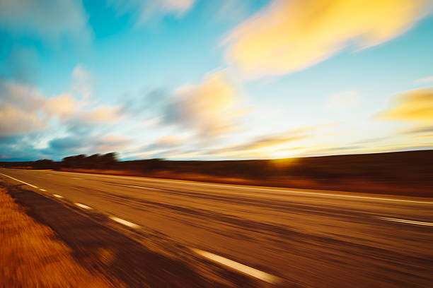 istock Picturesque landscape scene and sunset above road 628219360