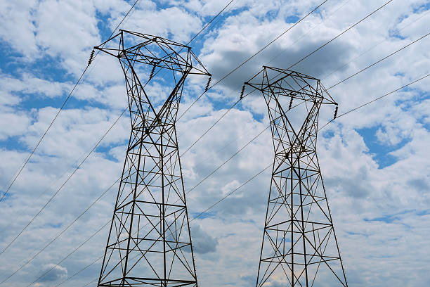 istock Electricity power station at a sunset.  High-voltage support. clouds 628219550