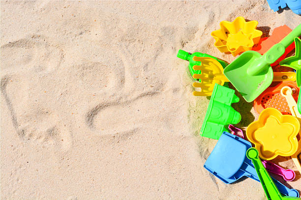 istock Many colorful beach toys in sand 628220652