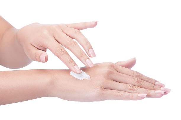 istock Moisturizer,Woman hands with cream 628221298