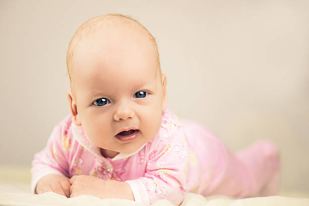istock cute dreamly little baby girl 628233292
